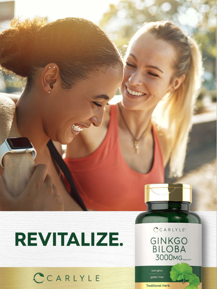 Two young women laughing outdoors in activewear with a Carlyle Ginkgo Biloba bottle nearby.