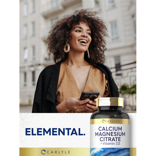 View 7 Smiling woman outdoors, holding a phone and a Carlyle Cal-Mag Citrate with D bottle.