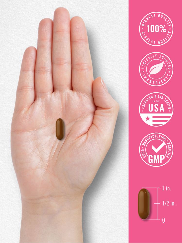 A single brown softgel sits on a palm, measuring approximately 1 inch in length.