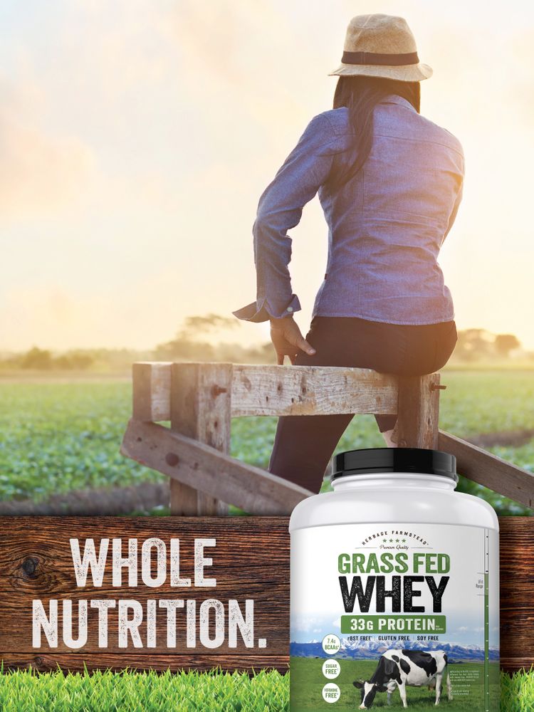 White tub of Carlyle Grass Fed Whey, 5 lb unflavored, labeled 'GRASS FED WHEY 33G PROTEIN'. Image labeled as hand_scale.