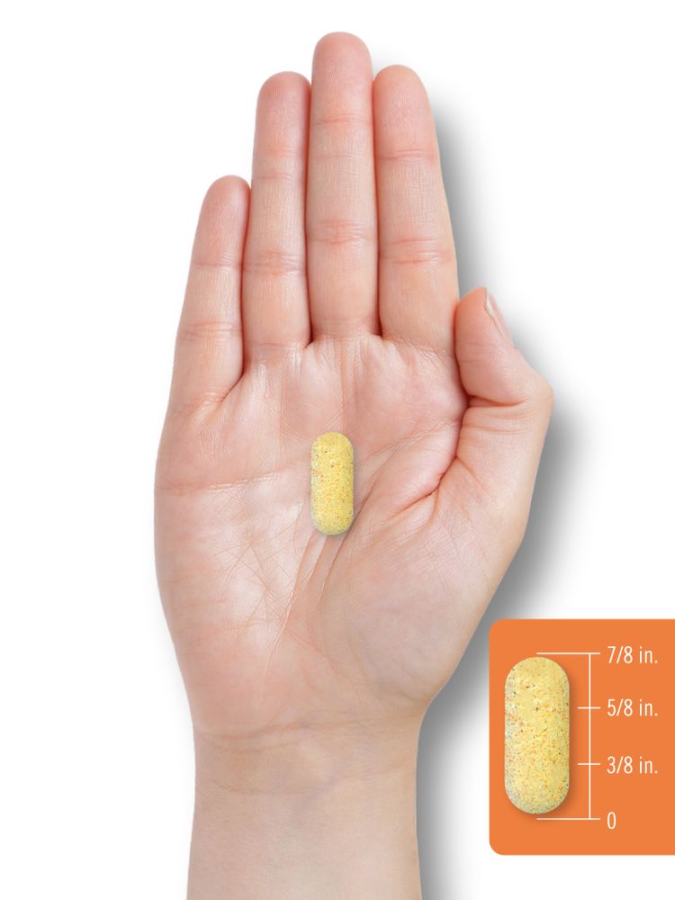 Yellow speckled oblong tablet, 7/8 inch long, held in a hand. Inset shows tablet with length markers 0, 3/8 in., 5/8 in., 7/8 in.