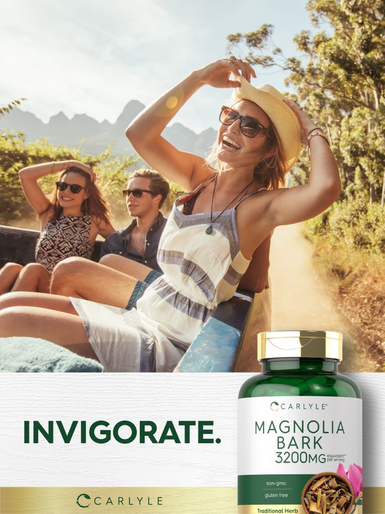 Hand holding green capsules of Carlyle Magnolia Bark, 3200mg equivalent per serving.