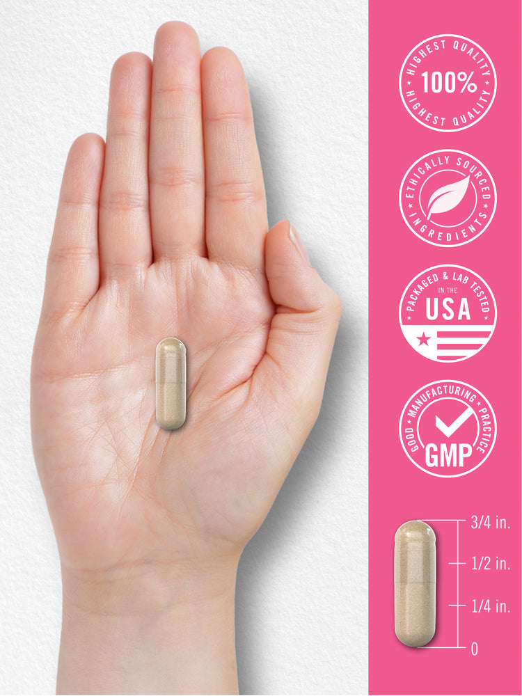 A single capsule, 3/4 inch long, is held in a hand next to a measurement scale for size reference.