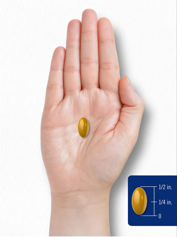 A softgel is held in a hand, measuring half an inch long and a quarter inch wide.