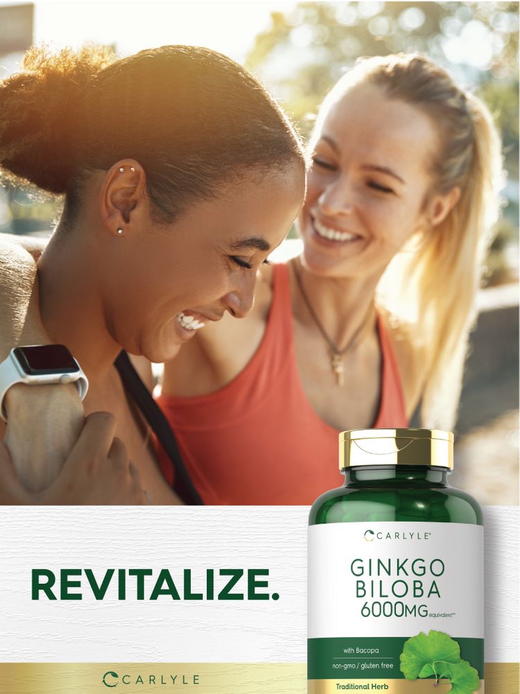 Two young women laughing outdoors next to a bottle of Carlyle Ginkgo Biloba.