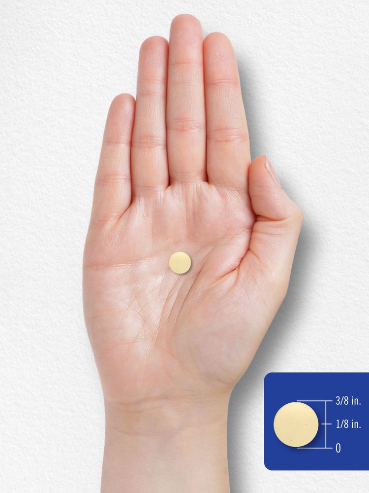 A round tablet measuring 3/8 inch in diameter and 1/8 inch in thickness.