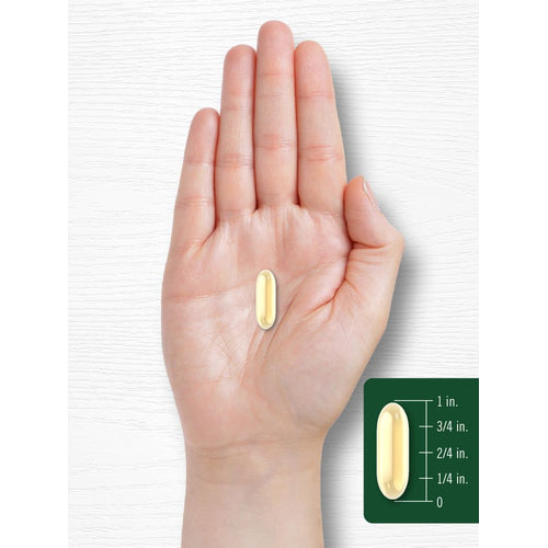View 8 A softgel capsule shown on a hand scale, measuring 1 inch in length, highlighting its compact size for easy ingestion.