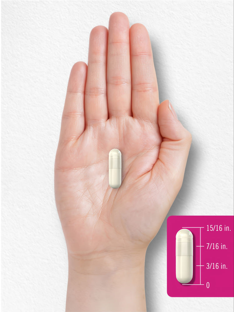 Carlyle Myo-Inositol 2600 mg capsule shown beside a hand, measuring approximately 15/16 inch.