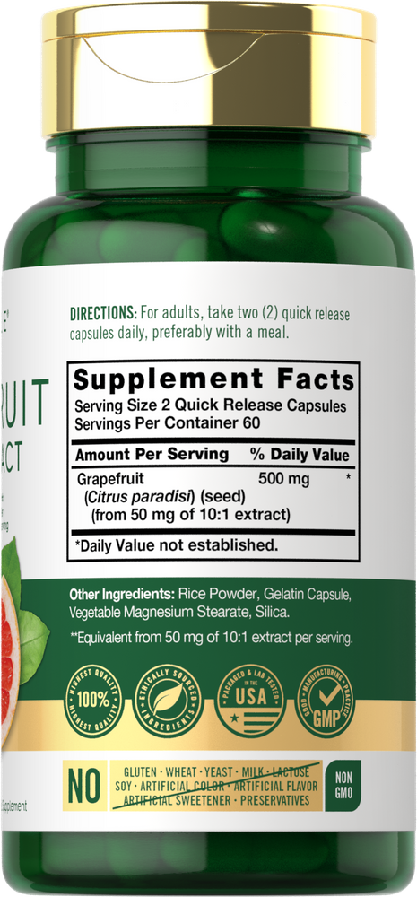 A hand holding a bottle of Grapefruit Seed 500 mg Quick Release Capsules, demonstrating size and packaging details.