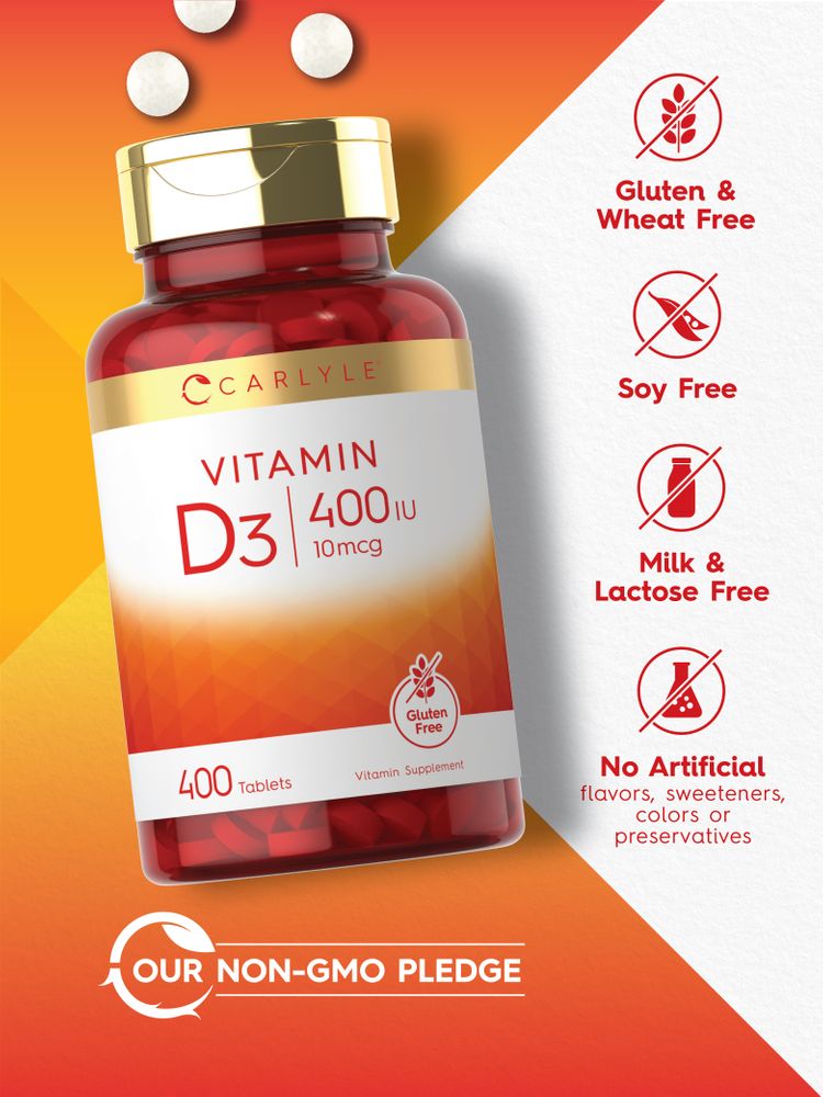 White, round Carlyle Vitamin D 400 IU tablets in bulk on a scale.