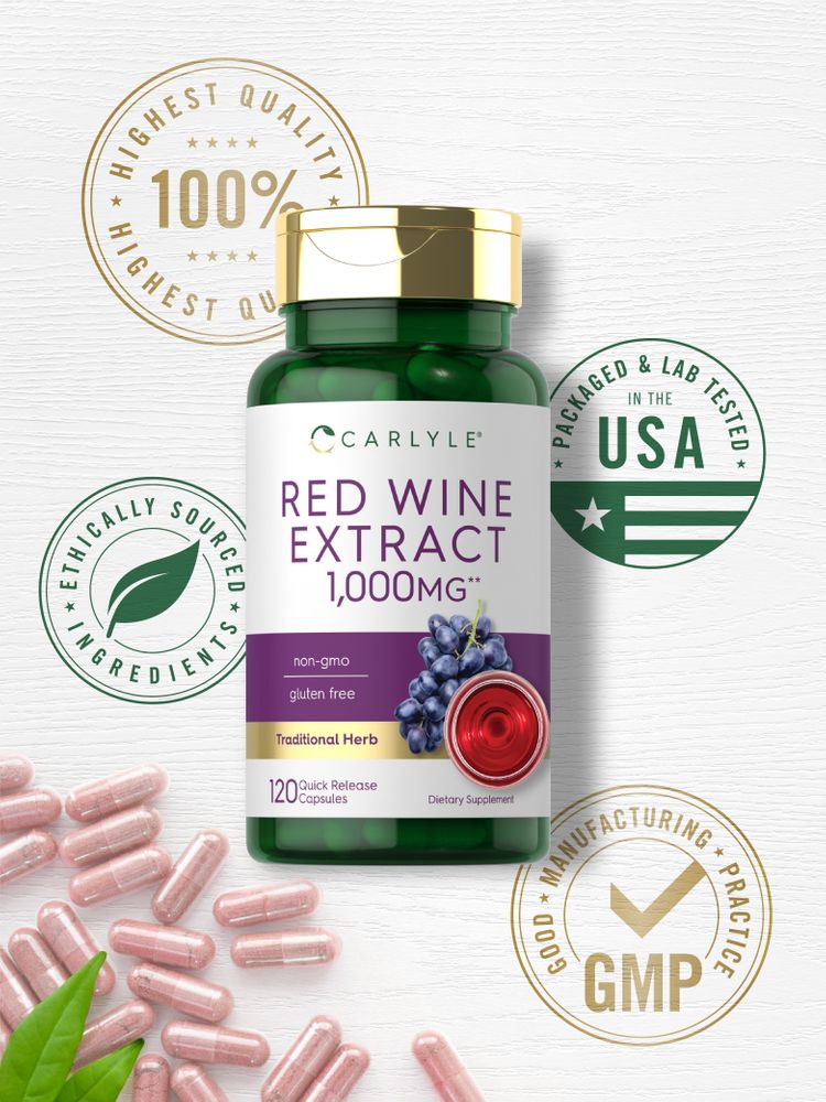 Hand holding 120 pinkish-beige Quick Release Capsules.