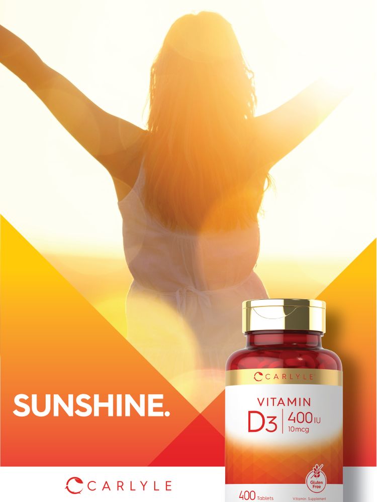 Woman with arms outstretched in sunlight next to a Carlyle Vitamin D3 bottle.