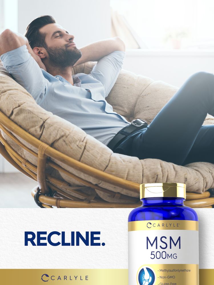 A man relaxing in a chair with a Carlyle MSM bottle in his hand, suggesting a moment of ease and supplementation.